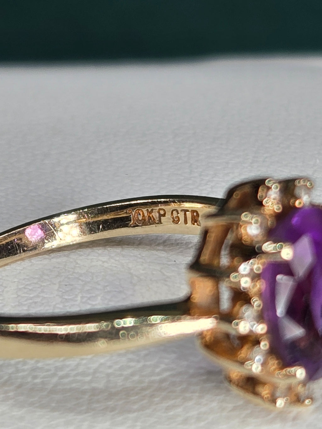 macro of amethyst facet and setting