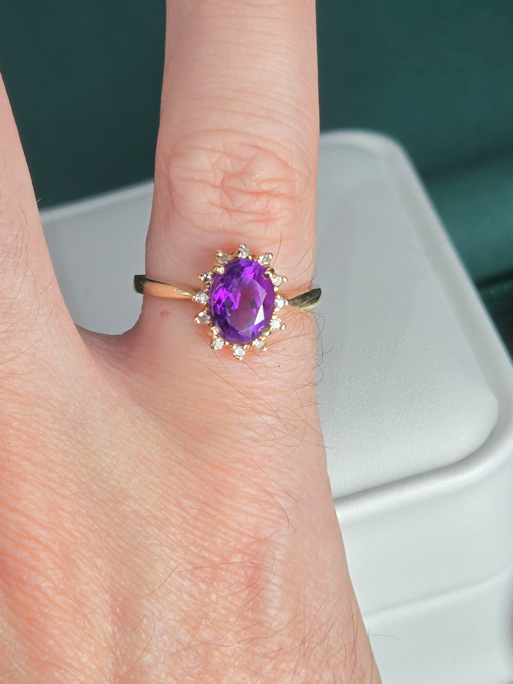 ring on display stand highlighting color and sparkle