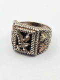 Vintage Coleman Black Hills ring with onyx eagle motif and 12k gold accents.