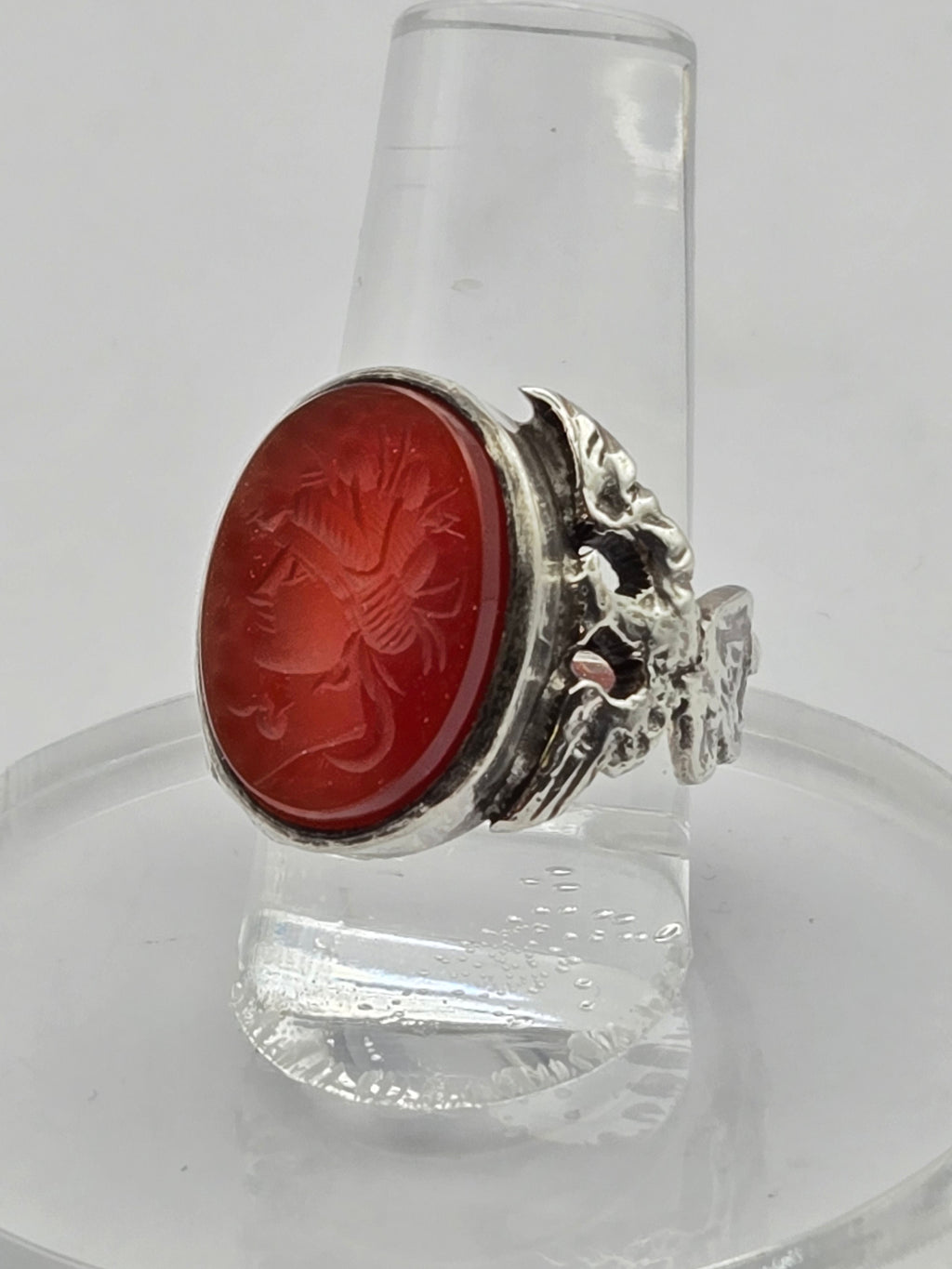 macro of carnelian color and carved lines