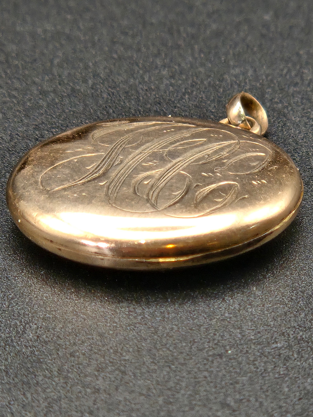 macro of engraved star design inside locket