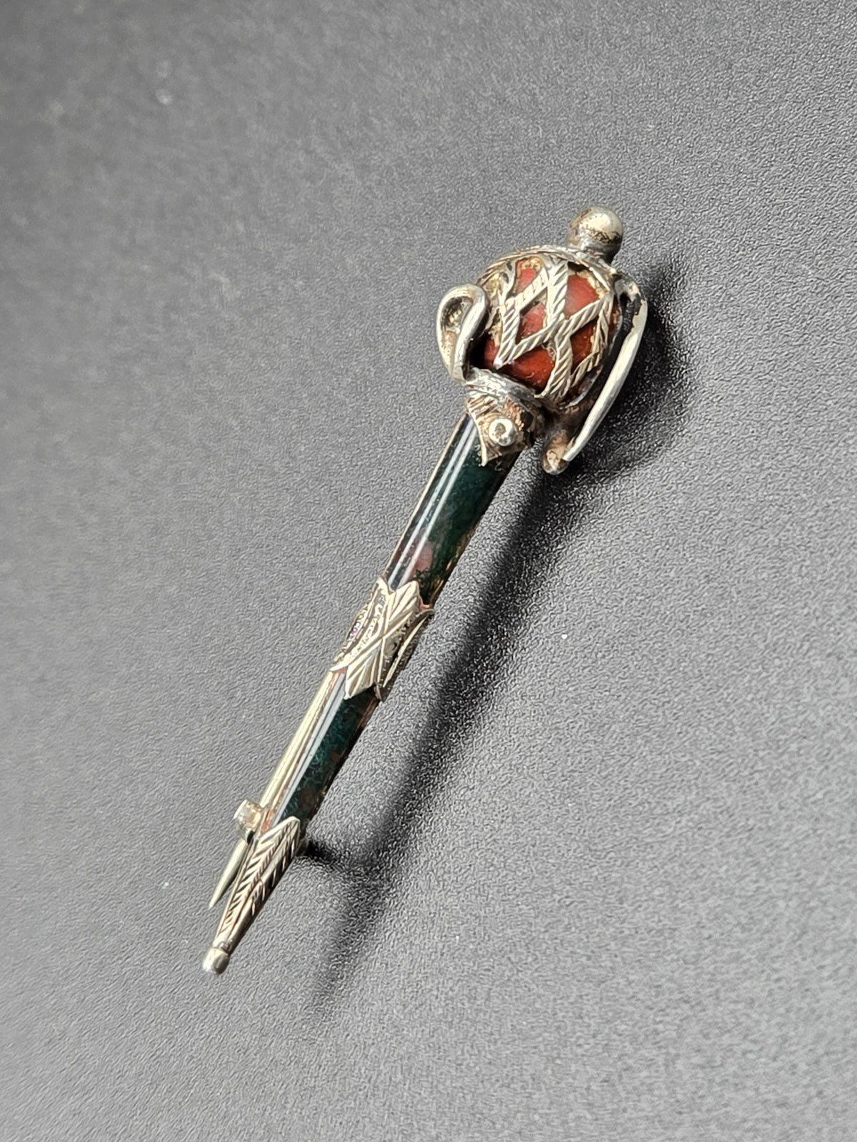 brooch shown flat highlighting jasper and bloodstone cabochons