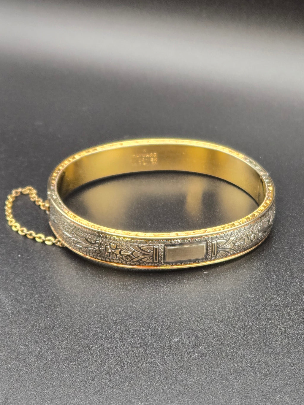 1920s Walter Haywood gold filled bangle bracelet, front view of etched design.