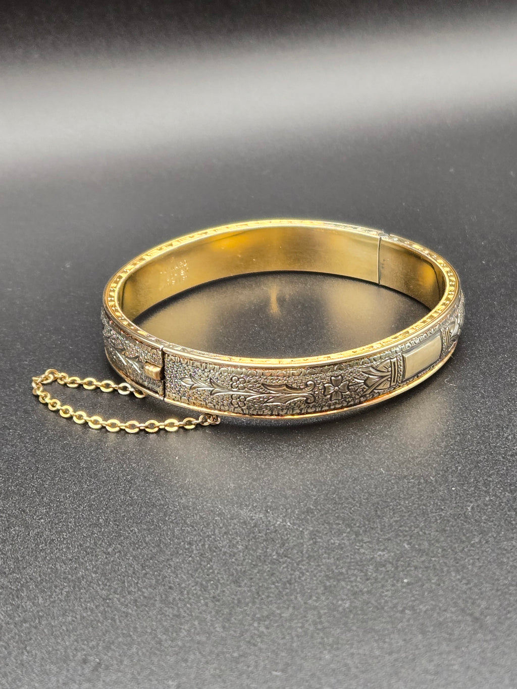 Close-up of the hinge and clasp on the Walter Haywood gold filled bangle.