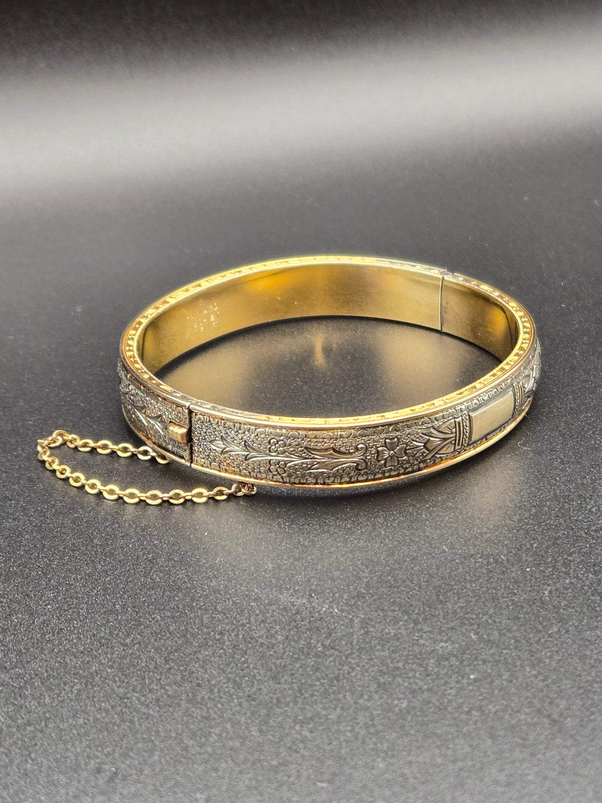 Close-up of the hinge and clasp on the Walter Haywood gold filled bangle.