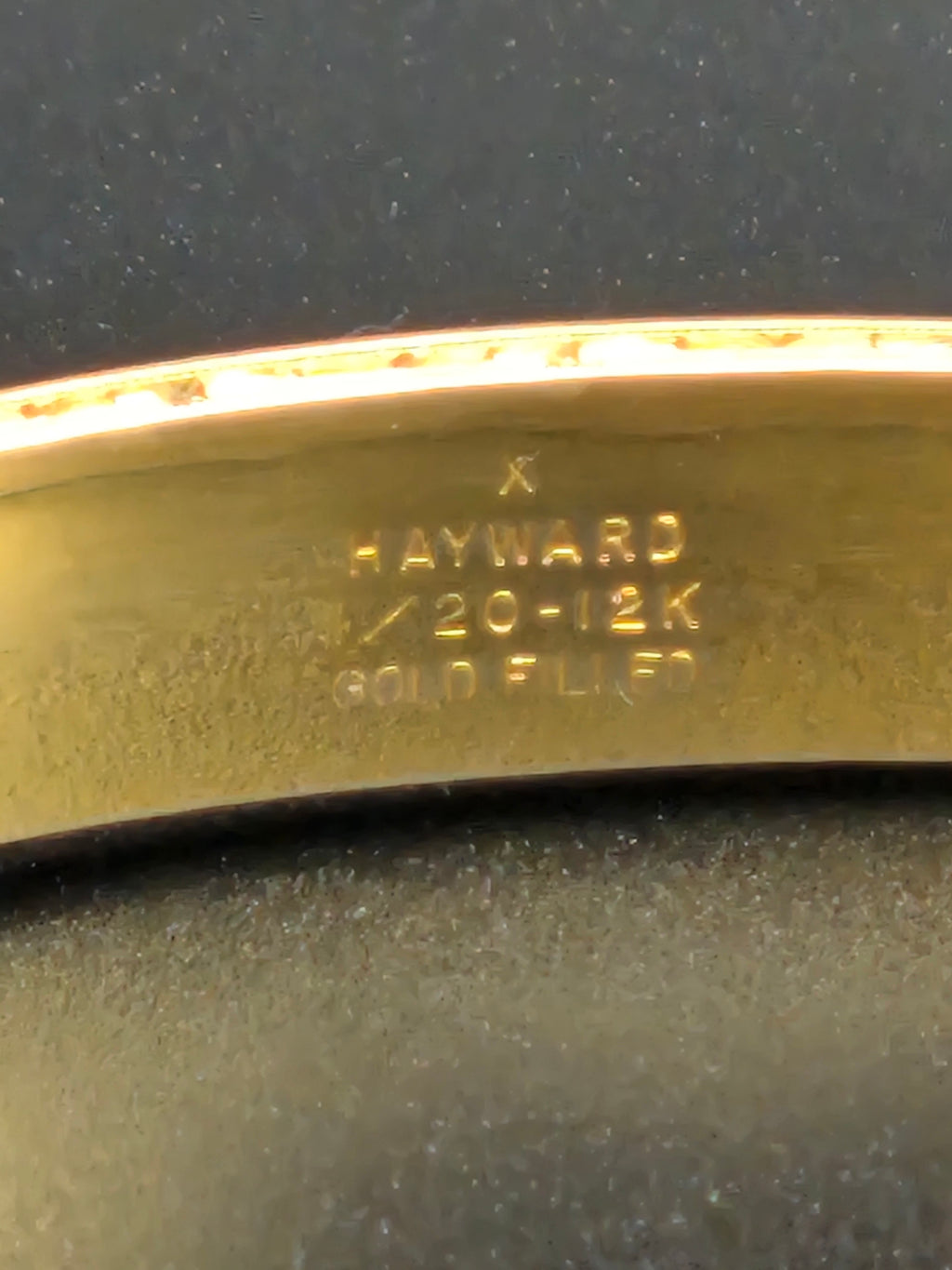 Detail of hand-etched pattern on the 1920s gold filled bangle bracelet.