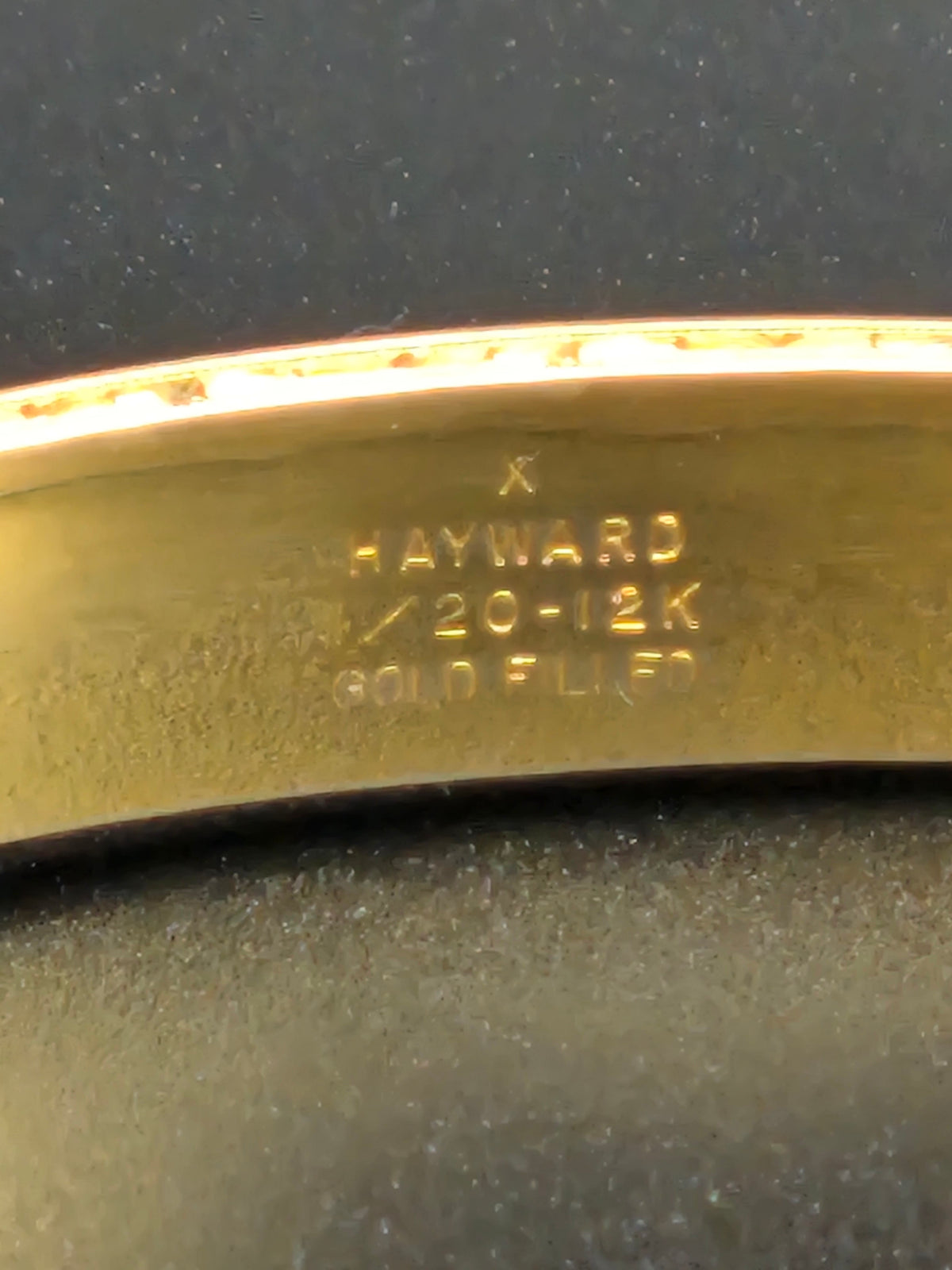 Detail of hand-etched pattern on the 1920s gold filled bangle bracelet.