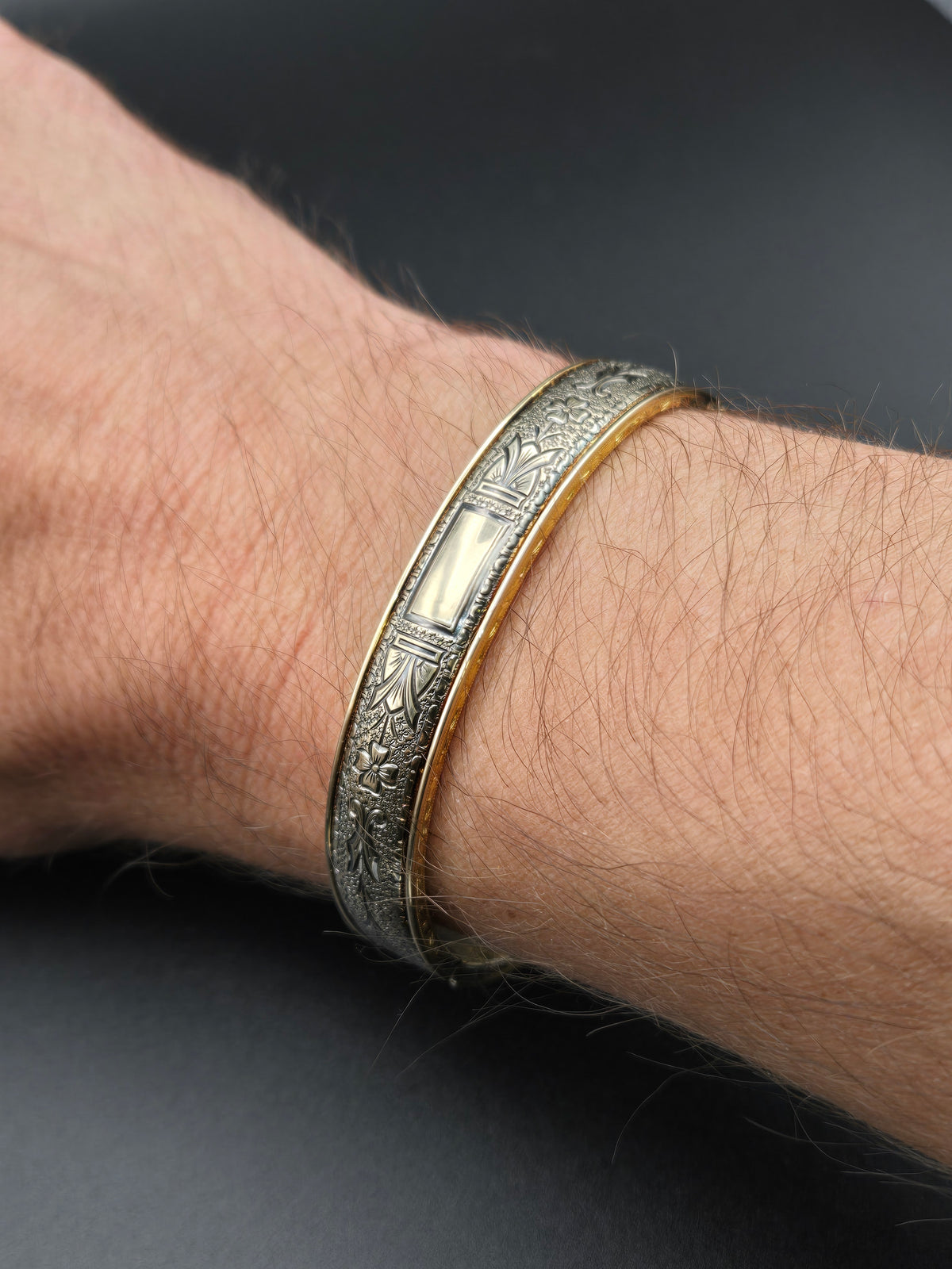 Walter Haywood bangle bracelet shown on wrist for scale.