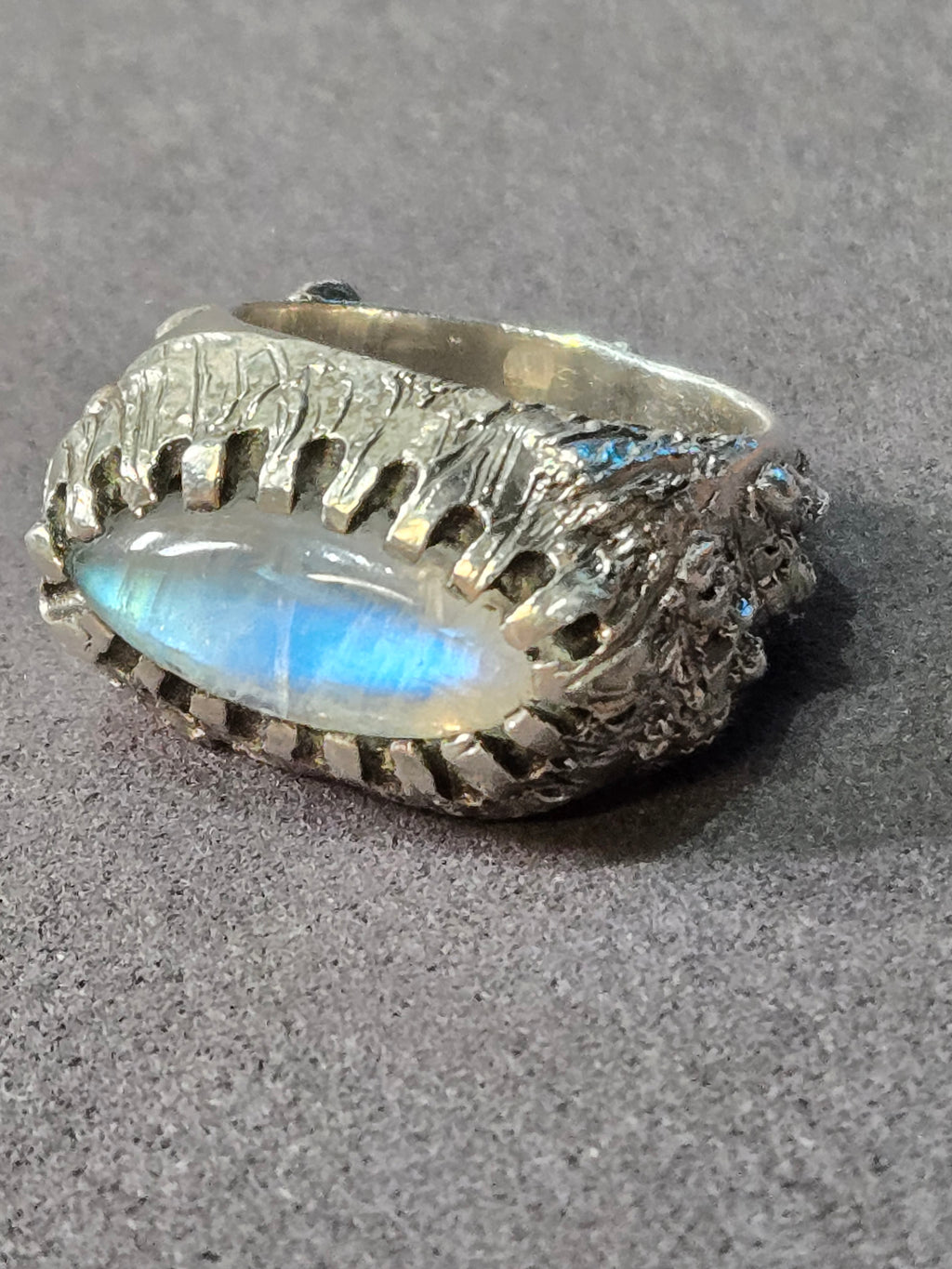 top view of sterling moonstone ring showing adularescence