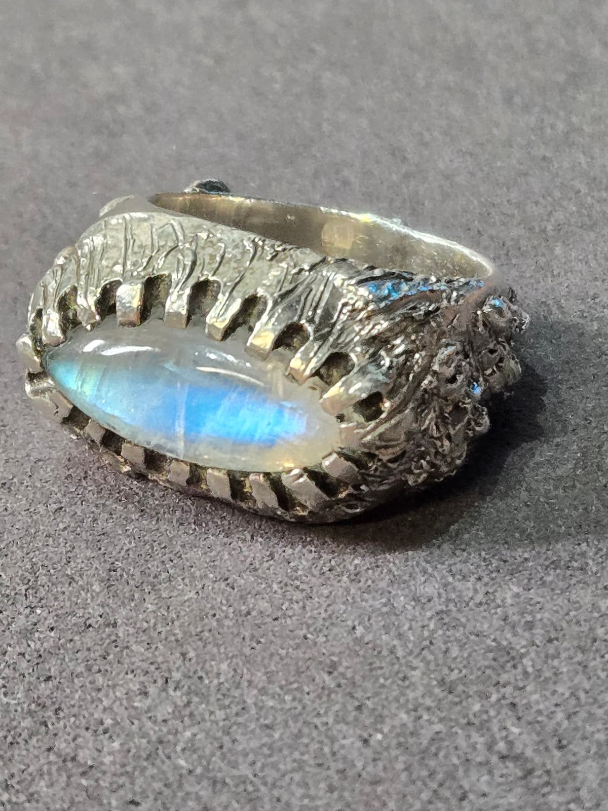 top view of sterling moonstone ring showing adularescence