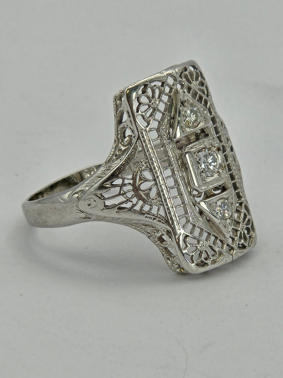 top view showing three diamond panels and filigree shoulders