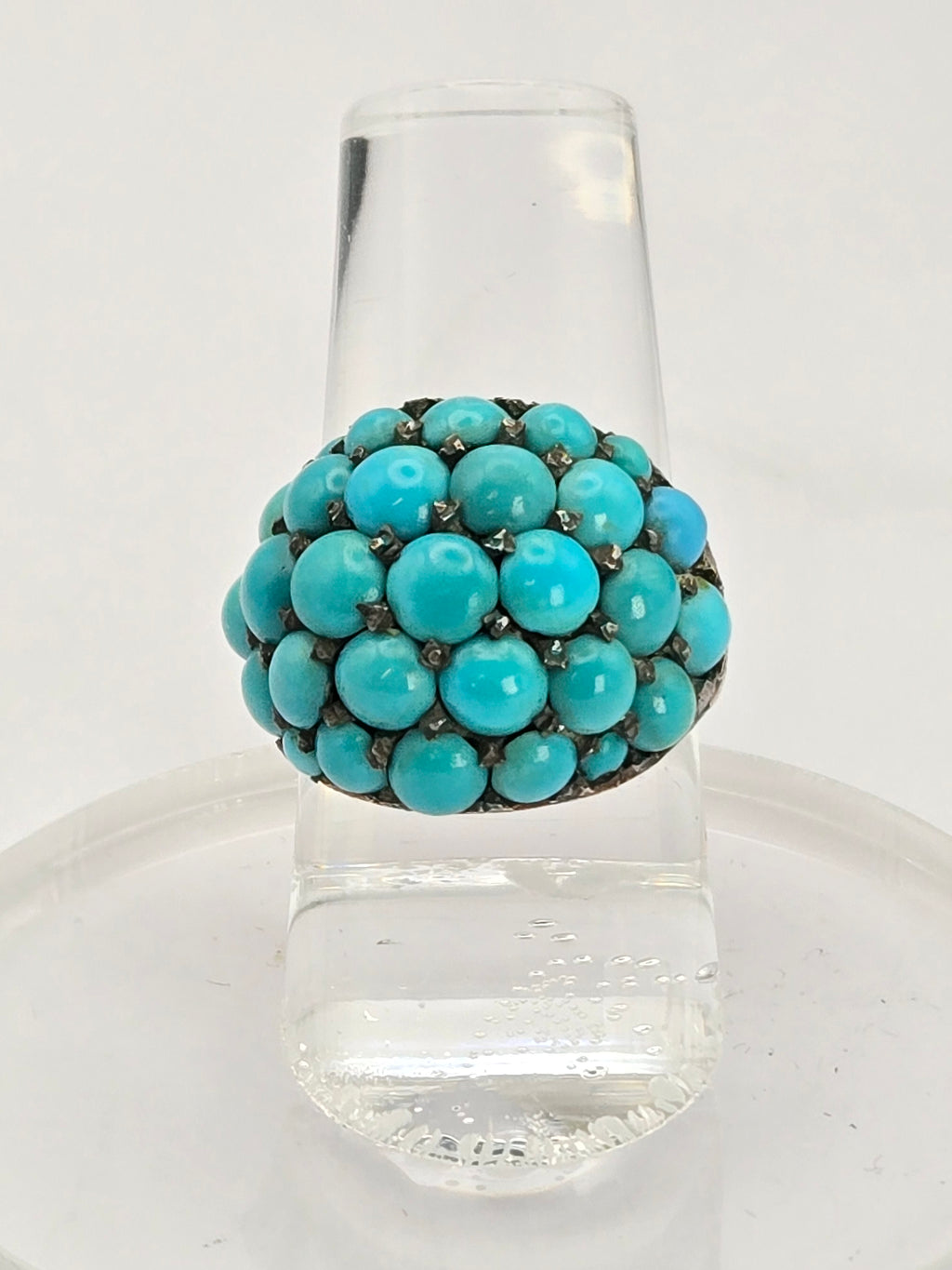 close-up of turquoise surface and setting detail